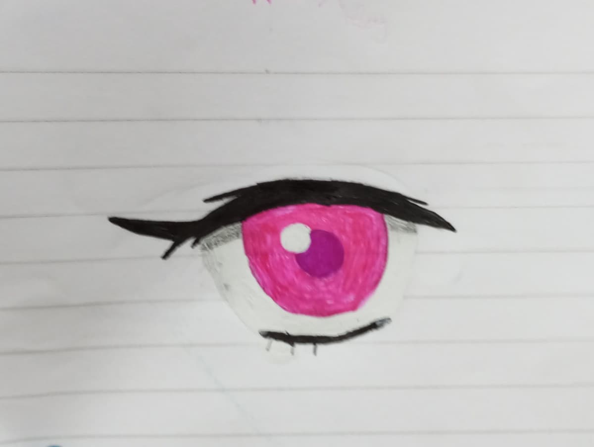 Sarebbe l'occhio d Nezuko ma non so se si capisce, in più l'ho colorato con un pennarello scarico della mia amica però ne sono fiera lmao