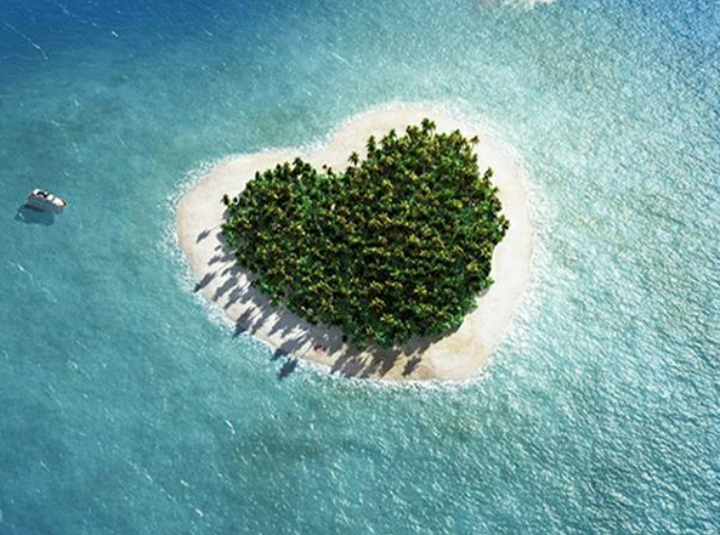 questa è l'isola Tavarua, nell'arcipelago delle Fiji nell'oceano Pacifico, ed è una delle isole che più al mondo assomigliano a un cuore ?